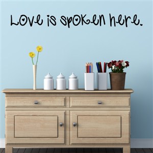 Love is a spoken here. - Vinyl Wall Decal - Wall Quote - Wall Decor